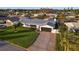 Aerial view of home showcases the new grey roof, waterfront location and the newly landscaped yard at 1367 51St Ne Ave, St Petersburg, FL 33703