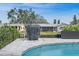 Beautiful pool with a Buddha statue and view of canal homes at 1367 51St Ne Ave, St Petersburg, FL 33703