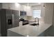 Modern kitchen with white cabinets and quartz countertops at 5980 80Th N St # 106, St Petersburg, FL 33709