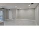 Spacious living room with neutral walls and tile floors at 5980 80Th N St # 106, St Petersburg, FL 33709