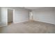 Spacious bedroom with neutral walls and carpet, featuring a large closet at 8277 Bower Bass Cir, Wesley Chapel, FL 33545