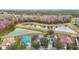 Aerial view showcasing home's location near a pond at 10918 Ancient Futures Dr, Tampa, FL 33647