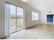 Dining area with sliding glass doors leading to the backyard at 10918 Ancient Futures Dr, Tampa, FL 33647