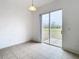 Dining area with sliding glass doors to backyard at 10918 Ancient Futures Dr, Tampa, FL 33647