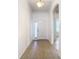 Clean entryway with tile floor and interior door at 10918 Ancient Futures Dr, Tampa, FL 33647