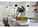 Kitchen island with white quartz countertop and stylish decor at 1518 E Knollwood St, Tampa, FL 33610