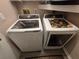 Stackable Samsung washer and dryer in the laundry room at 3600 Magnolia Ridge Cir # 1221-G, Palm Harbor, FL 34684