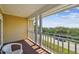 Relaxing balcony with white railing and scenic views of the street and ocean at 6231 Bayshore Blvd, Tampa, FL 33611