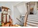 Inviting entryway with staircase and decorative hat rack, and a view of other rooms at 6231 Bayshore Blvd, Tampa, FL 33611