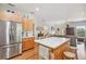 Open concept kitchen showcasing stainless steel appliances and view into the living room at 6231 Bayshore Blvd, Tampa, FL 33611