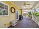 Covered patio with ceiling fan, bench, and view of the outdoors at 6231 Bayshore Blvd, Tampa, FL 33611