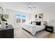 Bright bedroom with large window and hardwood floors at 208 W Frances Ave # 1, Tampa, FL 33602