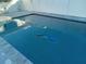 Inviting swimming pool with unique mermaid mosaic tile at 4310 Huntington Ne St, St Petersburg, FL 33703