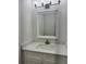 Bathroom with vanity and a large mirror at 37570 Teri Ct, Dade City, FL 33525