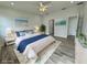 Spacious bedroom with wood-look floors and coastal decor at 37570 Teri Ct, Dade City, FL 33525
