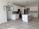 Modern kitchen with white cabinets and large island at 37570 Teri Ct, Dade City, FL 33525