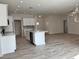 Modern kitchen with white cabinets and large island at 37570 Teri Ct, Dade City, FL 33525