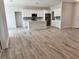 Open concept kitchen with white cabinets and island at 37570 Teri Ct, Dade City, FL 33525