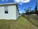 Side yard view showcasing a chain link fence at 37570 Teri Ct, Dade City, FL 33525