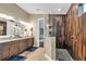 Spa-like bathroom with walk-in shower and double vanity at 4114 W Zelar St, Tampa, FL 33629