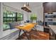 Breakfast nook with built-in bench seating and wooden table at 4114 W Zelar St, Tampa, FL 33629