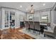 Bright dining room with hardwood floors and a view to the office at 4114 W Zelar St, Tampa, FL 33629