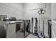 Convenient laundry room with washer, dryer, and storage at 4114 W Zelar St, Tampa, FL 33629