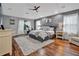 Spacious main bedroom with hardwood floors and a cozy sitting area at 4114 W Zelar St, Tampa, FL 33629