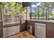 Outdoor kitchen with stainless steel appliances and granite countertops at 4114 W Zelar St, Tampa, FL 33629