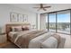 Main bedroom with wood floors and sliding doors to balcony at 500 N Osceola Ave # 802, Clearwater, FL 33755