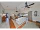 Living room with hardwood floors and access to the lanai at 2003 Wedge Ct, Sun City Center, FL 33573