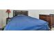 Bedroom with a double bed and dresser at 13204 Waterleaf Garden Cir, Riverview, FL 33579