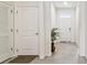Bright foyer with tile floors and access to rooms at 13204 Waterleaf Garden Cir, Riverview, FL 33579