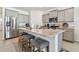 Modern kitchen featuring stainless steel appliances and granite countertops at 13204 Waterleaf Garden Cir, Riverview, FL 33579
