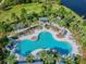 Resort-style pool with multiple seating areas at 13204 Waterleaf Garden Cir, Riverview, FL 33579