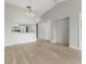 Bright dining room with hardwood floors and chandelier at 1662 Seascape Cir # 205, Tarpon Springs, FL 34689