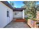 House exterior with storage and patio area at 1802 E Hamilton Ave, Tampa, FL 33610