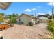 Charming backyard featuring a patio, seating area, and lush landscaping at 2210 4Th N Ave, St Petersburg, FL 33713