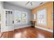 Bright room with wood floors, large windows, and neutral decor at 2210 4Th N Ave, St Petersburg, FL 33713