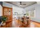 Dining area features wood floors, large windows and a vintage hutch at 2210 4Th N Ave, St Petersburg, FL 33713