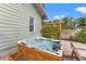 Outdoor hot tub surrounded by a trellis and beautiful landscaping at 2210 4Th N Ave, St Petersburg, FL 33713