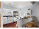 Modern kitchen featuring granite countertop with bar seating, stainless steel appliances at 2210 4Th N Ave, St Petersburg, FL 33713