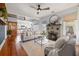 Well-lit living room with fireplace and open layout with access to the kitchen and dining at 2210 4Th N Ave, St Petersburg, FL 33713