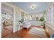 Sun room with light blue ceiling, lots of windows and refinished hardwood floors at 2210 4Th N Ave, St Petersburg, FL 33713