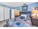 Cozy bedroom with a queen-size bed and built in closet at 1960 Alton Dr, Clearwater, FL 33763