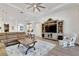 Relaxing living room with large TV and sliding glass doors to pool at 824 Manns Harbor Dr, Apollo Beach, FL 33572