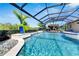 Inviting pool area with covered patio, creating a relaxing outdoor space at 824 Manns Harbor Dr, Apollo Beach, FL 33572