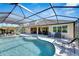 Resort-style pool and expansive patio perfect for entertaining at 824 Manns Harbor Dr, Apollo Beach, FL 33572