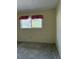 Empty bedroom with a window at 64 Inness Dr, Tarpon Springs, FL 34689