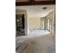 Spacious hallway with HVAC unit and access to other rooms at 64 Inness Dr, Tarpon Springs, FL 34689